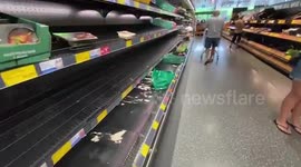 Supermarket shelves stripped bare as Australia's Brisbane goes into lockdown after discovery of UK variant