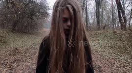 Demon Girl walking in the foggy forest