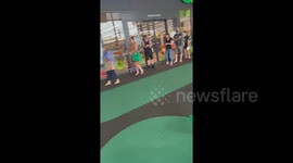 'Crazy lines' at shopping centre in Brisbane as city goes into lockdown after discovery of UK variant