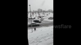 Spain: People Help Together Slipped Vehicle On Icy Roads In Toledo