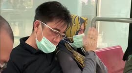 Families of passengers on missing Indonesian plane arrive at airport