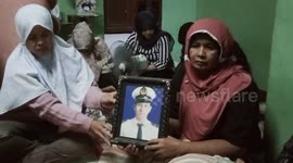 Heartbroken mother reveals son, 27, aboard missing Indonesia plane had recently become a first-time dad