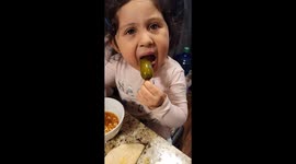 Brave little girl can eat pickled jalapeños like a champ