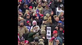 Trump supporters sing national anthem on steps of Capitol on day of siege