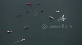 Indonesia plane crash: Aerial shots show search efforts as divers look for black boxes