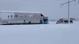 Vehicles get stranded on road due to record breaking heavy snow in Japan