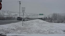 Icy roads and powers cuts as rare snowstorm hits Central Texas