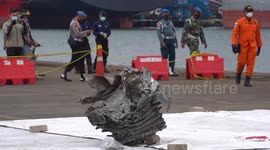 Debris from Indonesia passenger jet laid out for inspection