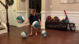 Georgia Kid dribbling 4 Basketballs