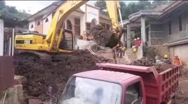 Search efforts continue after landslides kill 13 in Indonesia and leave 26 missing