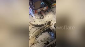 Snow turns closed highway into ‘ski resort’ for residents in southern China