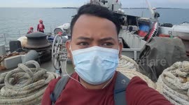 Talking in front of the camera at the scene of the Sriwijaya Air Ship Falling in the Thousand Islands of Indonesia