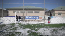 Rayo Majadahonda asks his supporter for help, hands and shovels to remove the snow from the football field in Madrid 13rd January, 2021.