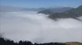 Beautiful sea of clouds coat mountains in northern Vietnam
