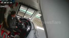 Chinese coach driver safely stops vehicle after being attacked by hammer-wielding passenger