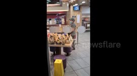 UK McDonald's customer slams 'absolutely disgusting' scenes after employee appears to be handling stack of delivery orders alone