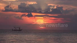 A dream magical sunrise on a tropical beach in Thailand.
