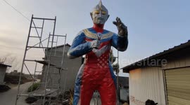 Chinese father uses abandoned tyres to create giant Japanese superhero character for his son's birthday