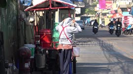 Bangkok residents shiver as temperatures fall to 15C