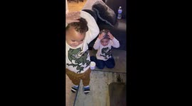'I am brushing my hair': US dad finds mischievous twin boys covering their heads with lotion
