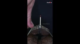 Flaming match in tin