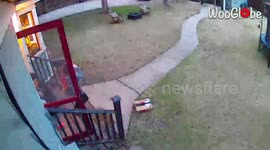 Woman Leaving The House Slips At The Stairs, Caught By Security Camera
