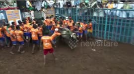 Indian festival sees 150 men attempt to tame bulls in traditional sporting event