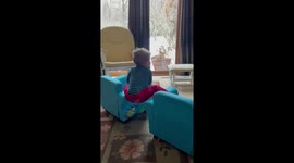 Home alone hairdo look Alike tries the splits on a chair