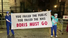 NHS staff gather outside Downing Street to protest government's handling of COVID-19 crisis