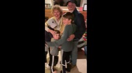 Pure joy! Kids so excited to see grandparents they don't notice new puppy