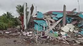 At least 34 dead as strong quake flattens buildings in Indonesia
