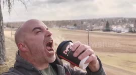 US man reviews coffee as he hilariously attempts to drink it in 60 mph winds