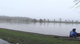 Derbyshire river bursts its banks and Kayakers take advantage of the weather conditions, UK