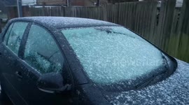 Snow falls in London amid weather warnings for much of UK