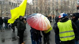 Paris :Protest in the snow for against the Globle Security Law and Covid measurements