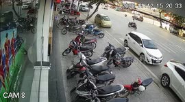 Loose Car Wheel Hits Shops In Vietnam