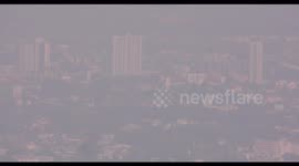 A blanket of dense smog due to crop burning shrouds Chiang Mai, Thailand