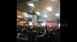 Mass of people wait for Alexei Navalny to land at Moscow airport
