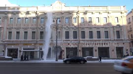 Snow clearance off the roofs on Tverskaya Street in freezing Moscow winter cold