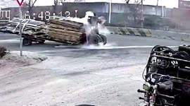 Tractor flips over backward on Chinese road after technical malfunction