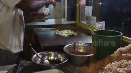 Delicious Sri Lankan street food. Cooking Kottu in Weligama