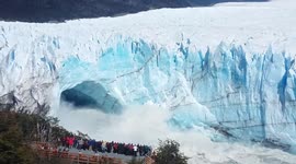 Crowds of onlookers watch massive glacier calving in Argentina