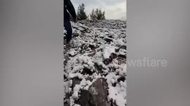 Snow covers mountains as temperatures plunge in Samos, Greece