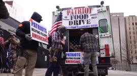 US 'patriots' hold food drive for the needy with goods donated by 'several militia groups'