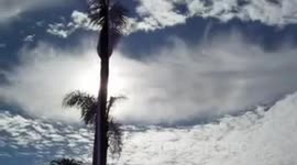 UFO Punches Hole In Sky