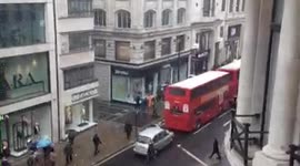 Snow and sleet on Oxford Street on 04th Apil 2013