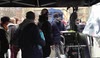 Matt Smith and Jenna Louise Coleman waiting to film a Doctor Who scene