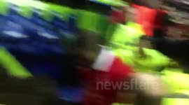 George Elokobi shoves Reading FC Steward