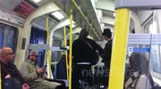 Buskers on tube train at Paddington