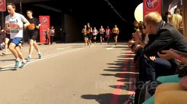 Marathon runners emerging from the darkness